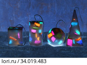 Handmade candles in the shape of a pyramid, cube, cylinder and sphere. Стоковое фото, фотограф Nataliia Zhekova / Фотобанк Лори