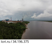Архангельский целлюлозно-бумажный комбинат. Большой завод на берегу реки. Россия, Архангельская область, город Новодвинск. Стоковое фото, фотограф Яковлев Сергей / Фотобанк Лори