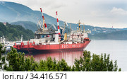 Russian cargo container ship nuclear-powered icebreaker Sevmorput Corporation FSUE Atomflot or Rosatomflot. Container terminal commercial seaport. Pacific Ocean (2019 год). Редакционное фото, фотограф А. А. Пирагис / Фотобанк Лори