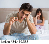 Man suffering from impotency with pill. Стоковое фото, фотограф Elnur / Фотобанк Лори