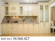 Luxury modern neoclassic beige kitchen interior. Стоковое фото, фотограф Сергей Старуш / Фотобанк Лори