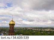 The upper part of the bell tower with a golden dome and a cross of the Church of the Resurrection of Christ in Vichuga, Ivanovo region, Russia (2020 год). Стоковое фото, фотограф Валерий Смирнов / Фотобанк Лори