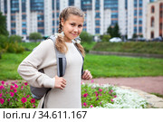 Smiling and happy female student in grade 6, Caucasian girl with school bag, copyspace portrait. Стоковое фото, фотограф Кекяляйнен Андрей / Фотобанк Лори