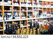 Closeup view on various alcohol beverage bottles. Стоковое фото, фотограф Яков Филимонов / Фотобанк Лори