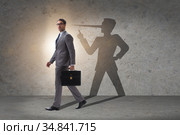 Concept of businessman liar with his shadow. Стоковое фото, фотограф Elnur / Фотобанк Лори