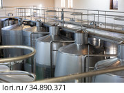Metallic cisterns for processing and fermentating wine in shop. Стоковое фото, фотограф Яков Филимонов / Фотобанк Лори