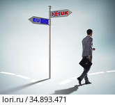 Businessman in Brexit concept - UK leaving EU. Стоковое фото, фотограф Elnur / Фотобанк Лори