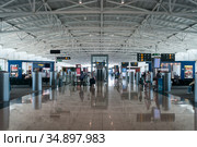 Interior of the Larnaca International Airport. The upper level of departures. Now it is named in honor of former President of Cyprus Glafcos Clerides (2010 год). Редакционное фото, фотограф Кекяляйнен Андрей / Фотобанк Лори