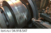 Close up view at lathe knife on lathe machine, forming unbalanced car brake disk. Стоковое видео, видеограф Кекяляйнен Андрей / Фотобанк Лори