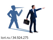 Concept of businessman liar with his shadow. Стоковое фото, фотограф Elnur / Фотобанк Лори