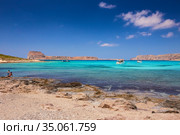 The beautiful seaview and the people on the beach of Gramvousa (2019 год). Редакционное фото, фотограф Helga Preiman / Фотобанк Лори