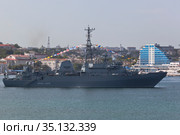 Корабль-разведчик "Иван Хурс" на параде в честь Дня ВМФ на фоне города- героя Севастополя, Крым (2020 год). Редакционное фото, фотограф Николай Мухорин / Фотобанк Лори