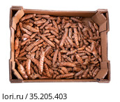 Dried turmeric rhizomes in cardboard box for sale. Стоковое фото, фотограф Яков Филимонов / Фотобанк Лори
