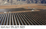 Солнечная электростанция в горном Алтае. Вид с воздуха. Solar power plant in the Altai Mountains. Aerial view. Стоковое видео, видеограф Евгений Романов / Фотобанк Лори