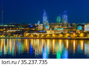 Baku, Azerbaijan - June 23, 2018: Colorful lights on Flame towers, symbol of baku at night. Стоковое фото, фотограф Константин Лабунский / Фотобанк Лори