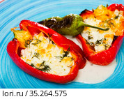 Pepper stuffed with brynza is tasty dish of Bulgarian cuisine. Стоковое фото, фотограф Яков Филимонов / Фотобанк Лори