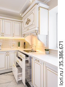 neoclassic style luxury kitchen interior with island. Стоковое фото, фотограф Сергей Старуш / Фотобанк Лори