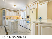 neoclassic style luxury kitchen interior with island. Стоковое фото, фотограф Сергей Старуш / Фотобанк Лори