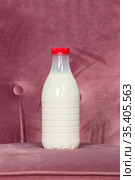One plastic bottle with milk, litre volume, red cap. Стоковое фото, фотограф Кекяляйнен Андрей / Фотобанк Лори