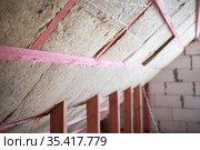 wall insulation with glass wool. Стоковое фото, фотограф Типляшина Евгения / Фотобанк Лори