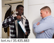 Man refusing to participate in survey at home. Стоковое фото, фотограф Яков Филимонов / Фотобанк Лори