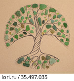 Transitory art arrangement - tree drawn on craft paper and and assortment of seaglass collected on beaches of Gran Canaria, representing seasonal change. Стоковая иллюстрация, иллюстратор Tamara Kulikova / Фотобанк Лори