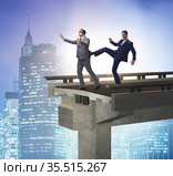 Business unethical competition concept with businessmen. Стоковое фото, фотограф Elnur / Фотобанк Лори