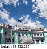 Belorusskiy railway station (written in Russian)-- is one of the nine main railway stations in Moscow, Russia. It was opened in 1870 and rebuilt in its current form in 1907-1912 (2016 год). Редакционное фото, фотограф Владимир Журавлев / Фотобанк Лори