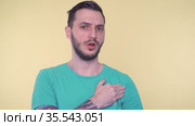 Sad man suffering from shoulder pain caused by sport injury. Стоковое видео, видеограф Mihail Mihaylov / Фотобанк Лори