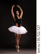 Pretty ballerina in tutu stand on pointess. Стоковое фото, фотограф Гурьянов Андрей / Фотобанк Лори