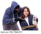 Gunman forcing a woman with the gun. Стоковое фото, фотограф Elnur / Фотобанк Лори