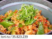Meat with rice and vegetables on black background. Стоковое фото, фотограф Марина Володько / Фотобанк Лори