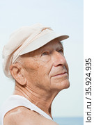 Senior man wearing a cap. Стоковое фото, фотограф Shannon Fagan / Ingram Publishing / Фотобанк Лори