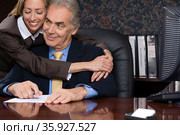 Woman hugging her boss. Стоковое фото, фотограф Shannon Fagan / Ingram Publishing / Фотобанк Лори