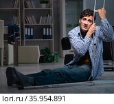 Man fell off wheelchair sitting on the floor. Стоковое фото, фотограф Elnur / Фотобанк Лори
