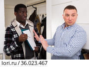 Man refusing to participate in survey at home. Стоковое фото, фотограф Яков Филимонов / Фотобанк Лори