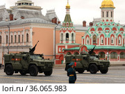 Бронеавтомобили многоцелевого назначения "Тайфун-ПВО" с боевым модулем дистанционного управления "Корд" во время парада на Красной площади в честь Дня Победы. Москва (2021 год). Редакционное фото, фотограф Free Wind / Фотобанк Лори