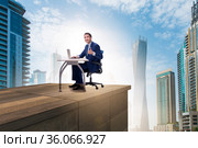 Businessman self isolating on the top. Стоковое фото, фотограф Elnur / Фотобанк Лори
