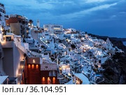 Night view of Fira-a city on the island of Santorini in the evening, Greece (2017 год). Редакционное фото, фотограф Наталья Волкова / Фотобанк Лори