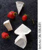 Camembert on black background. Стоковое фото, фотограф Марина Володько / Фотобанк Лори