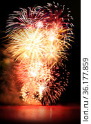 Beautiful fireworks in night sky. Стоковое фото, фотограф ElenArt / Фотобанк Лори