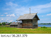 Кижи. Карелия, Россия. Часовня Апостолов Петра и Павла из деревни Бережная (2021 год). Редакционное фото, фотограф Natalia Sidorova / Фотобанк Лори