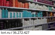 Assortment of haircare products and wigs at cosmetics store (2020 год). Редакционное видео, видеограф Яков Филимонов / Фотобанк Лори