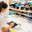 A schoolgirl girl tests a gadget in a store. Стоковое фото, фотограф Владимир Ушаров / Фотобанк Лори
