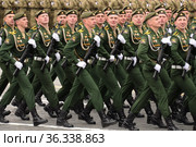 Курсанты военной академии радиационной, химической и биологической защиты имени Маршала Советского Союза С.К.Тимошенко во время парада на Красной площади Москвы в честь Дня Победы (2021 год). Редакционное фото, фотограф Free Wind / Фотобанк Лори