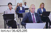 international group of managers with laptop in advanced training courses. Стоковое видео, видеограф Яков Филимонов / Фотобанк Лори
