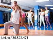 Young woman training chokehold. Стоковое фото, фотограф Яков Филимонов / Фотобанк Лори
