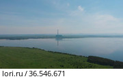 Aerial drone view of lake landscape with road. Стоковое видео, видеограф Jan Jack Russo Media / Фотобанк Лори