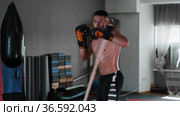 Sweaty young man boxer training to dodge in the gym. Стоковое видео, видеограф Константин Шишкин / Фотобанк Лори