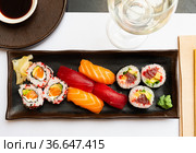 Set of different sushi - makis, uramaki and nigiris. Стоковое фото, фотограф Яков Филимонов / Фотобанк Лори
